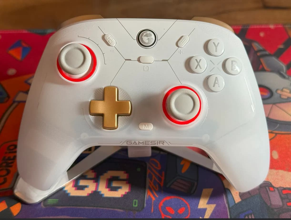 The white GameSir Cyclone 2 controller with its red-lit sticks
