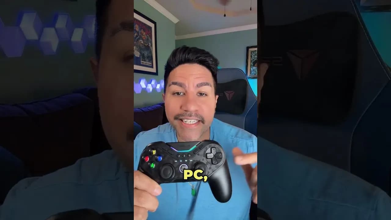 SuperZydan holding up the black GameSir Tarantula Pro controller