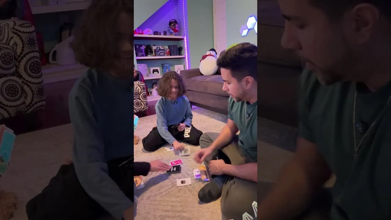 The family playing Taco vs Burrito at the table
