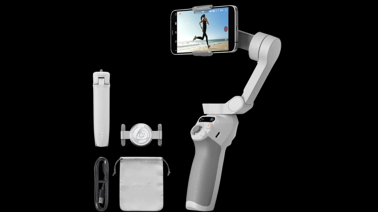 The DJI Osmo Mobile phone gimbal with its tripod and accessories