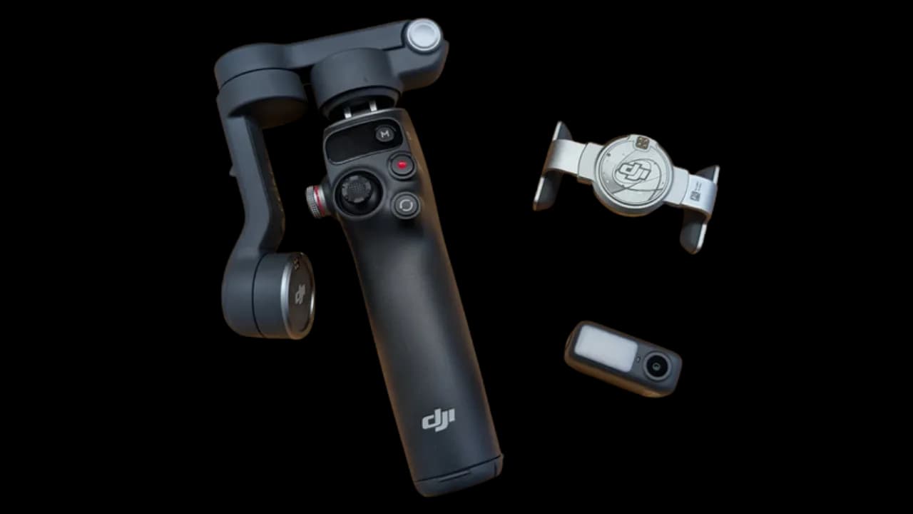 The DJI Osmo Mobile 7P folded up with its accessories